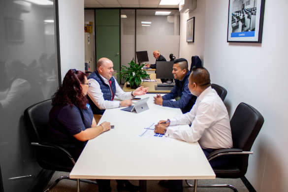 Cleaners having a meeting